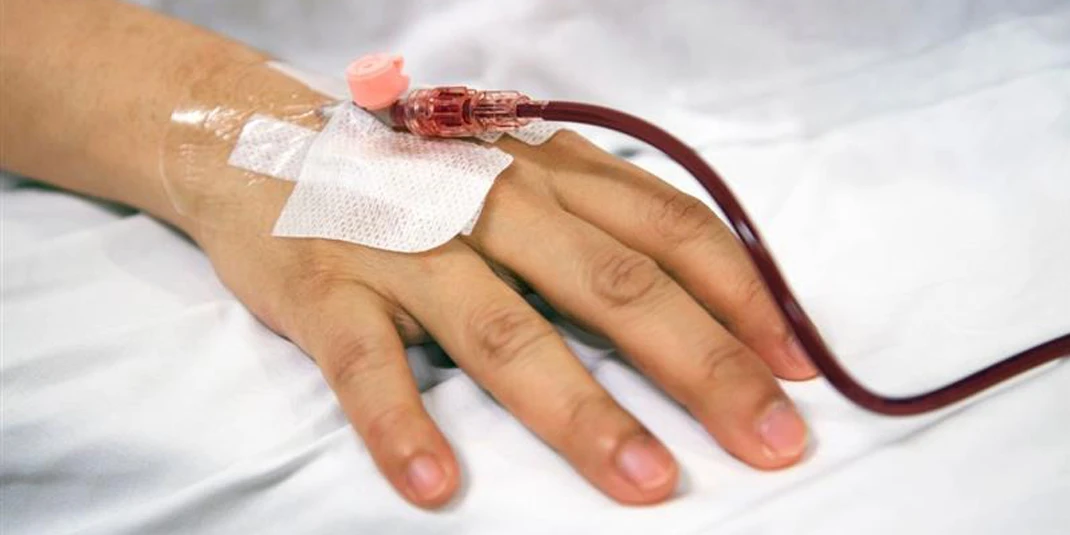 Patient hand with IV drip