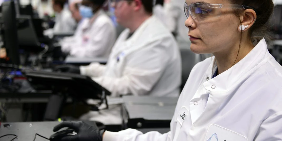 Lab staff at workstation